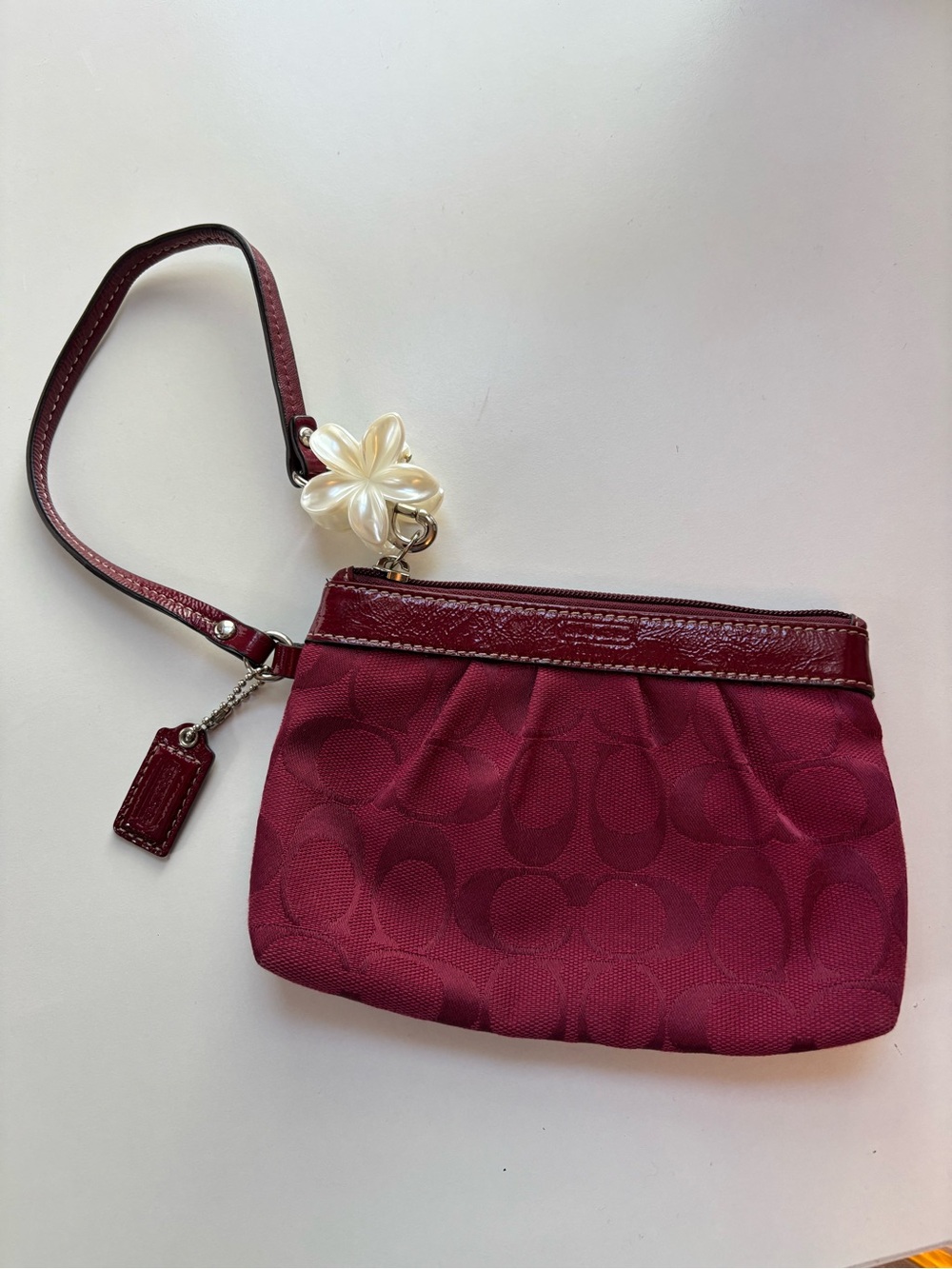 Coach Maroon Signature Wristlet with Pearl Flower Charm